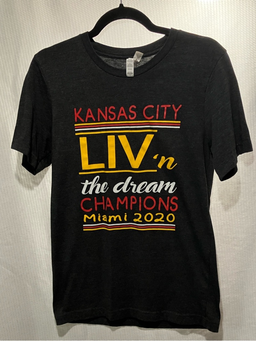 Bella Canvas Black Kansas City LIV'n The Dream Champions Miami 2020 Tee